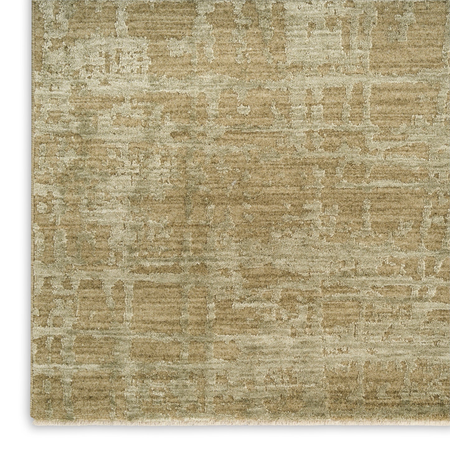 Beige distressed geometric area rug with subtle rectangular pattern and white fringe along the edge.