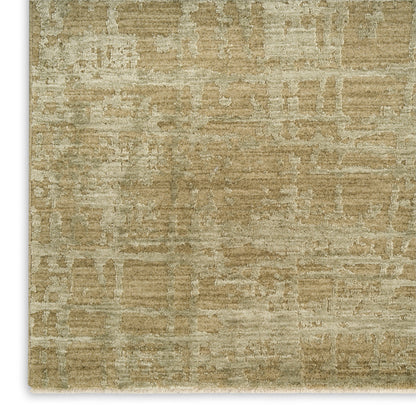 Beige distressed geometric area rug with subtle rectangular pattern and white fringe along the edge.