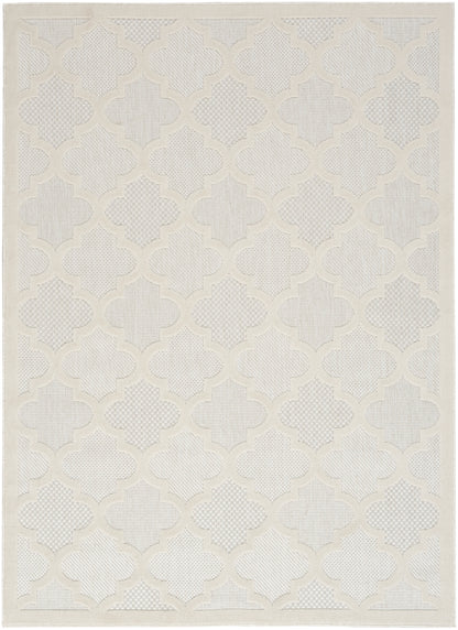 Cream and ivory woven area rug with a raised trellis quatrefoil pattern; neutral modern style.