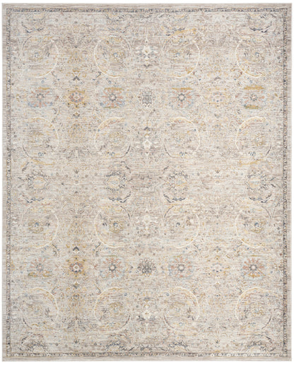 Rectangular, neutral distressed area rug with vintage Persian floral medallions in cream, beige, and pale gray.