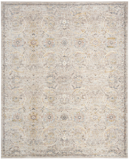 Rectangular, neutral distressed area rug with vintage Persian floral medallions in cream, beige, and pale gray.