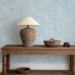 Chamomile Wallpaper by Morris & Co. in China Blue featuring delicate chamomile flowers, fine hand-drawn linework, and an elegant repeating botanical pattern. This luxury blue heritage wallpaper inspired by William Morris artwork creates a timeless Arts & Crafts look for bedrooms, living rooms, dining spaces, and statement walls.