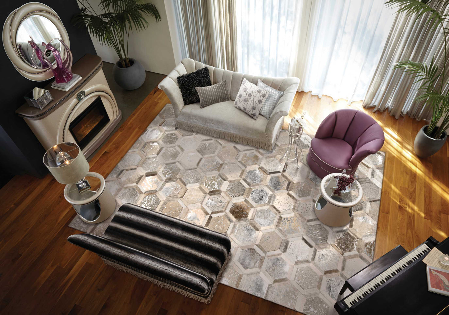 Modern living room with hexagon metallic rug, beige sofa with cushions, plum curved chair, glass side tables, potted plants.