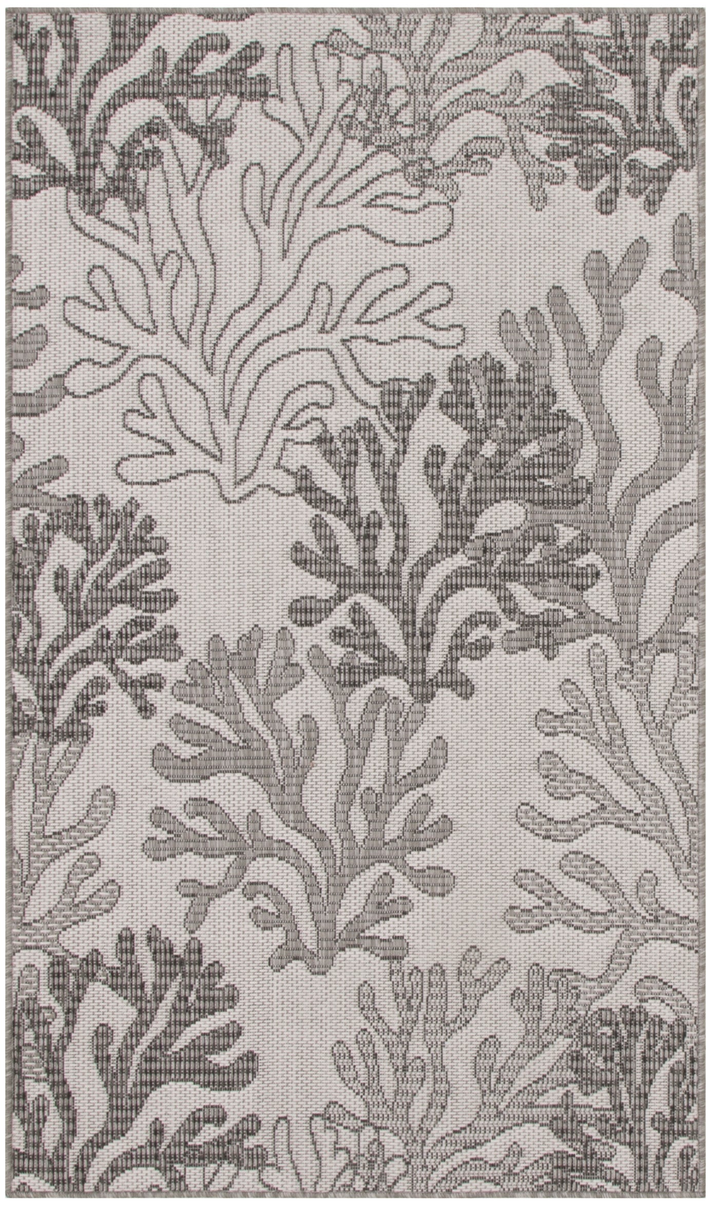 Gray coral-pattern rug on light taupe background; woven coastal textile with botanical reef motif.