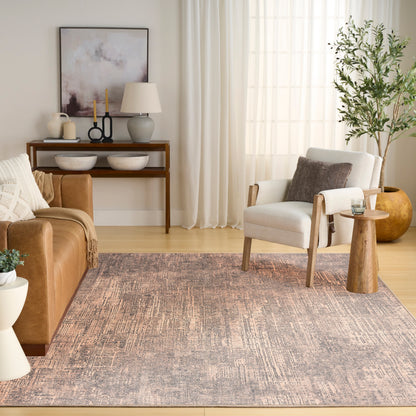 Muted lavender-gray area rug in a contemporary living room with a leather sofa, white armchair, and wood accents.