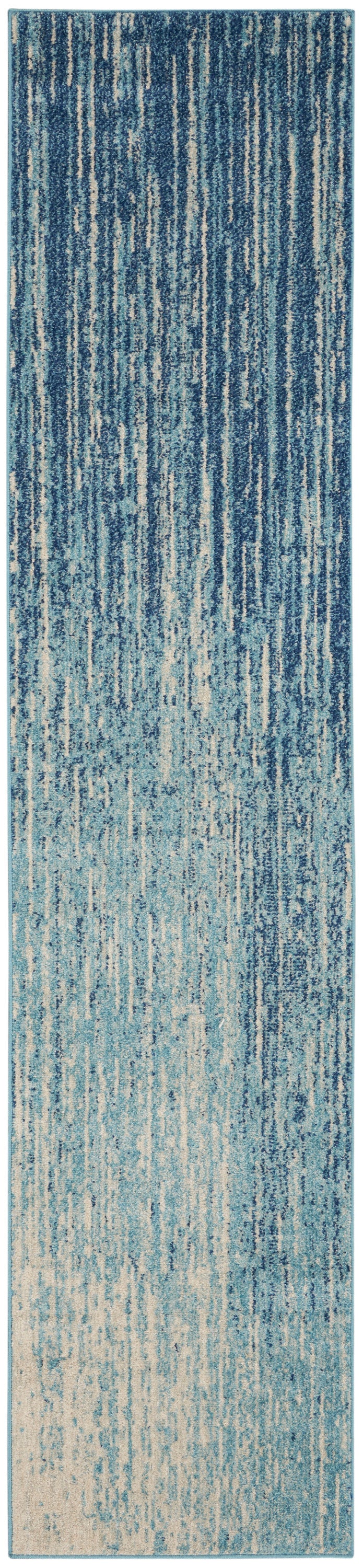 Blue-toned abstract striped runner rug with vertical brushstroke pattern and textured pile.