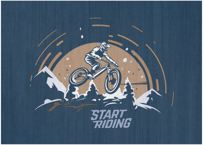 Blue textured backdrop with vintage mountain bike graphic, rider jumping over pines and mountains, sun arc, START RIDING.