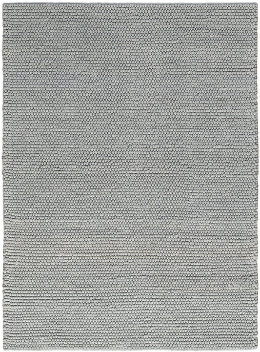 Light gray loop-pile rug with tight textured weave, rectangular, soft modern home decor.
