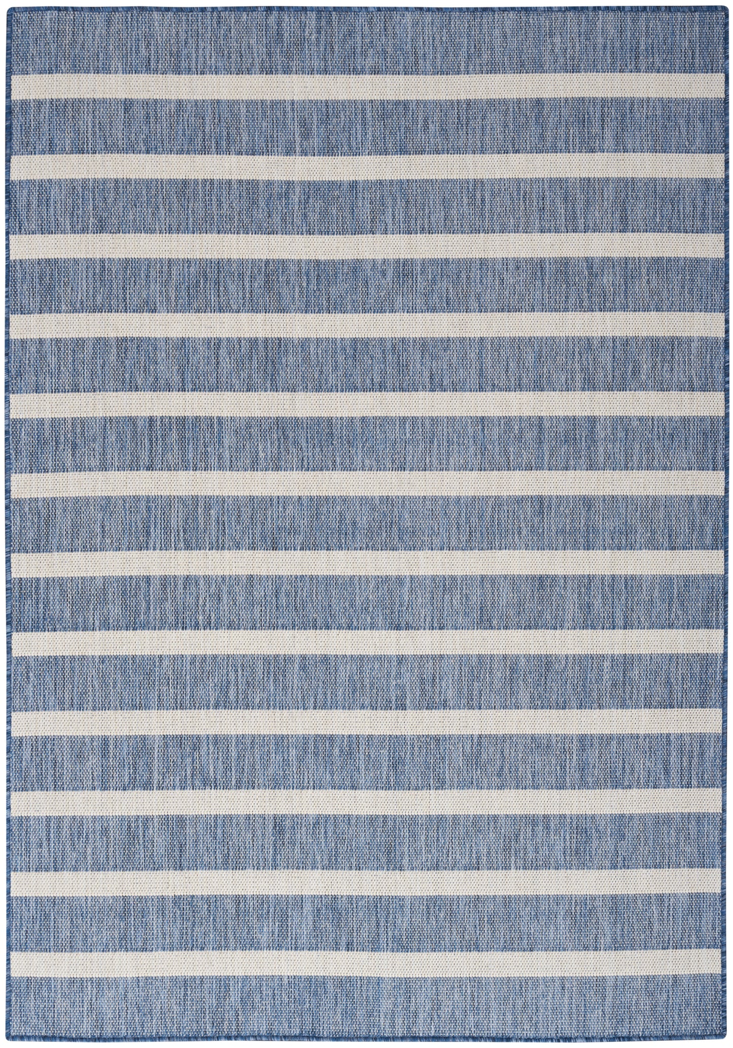 Blue denim rug with cream horizontal stripes; woven texture, rectangular area rug for living room.
