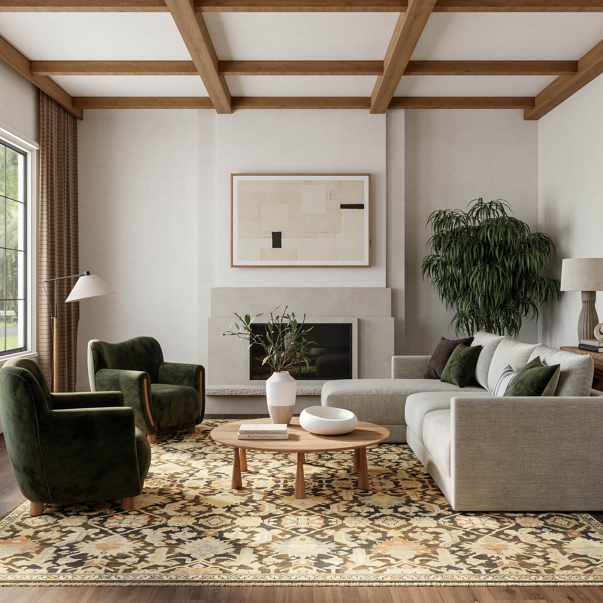 Vintage 8' x 10' rug in a cozy living room setting with beige walls, wood-beam ceiling, gray sofa, green velvet chairs, wood coffee table and a fireplace.