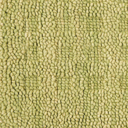 Olive-green loop-pile carpet texture with dense, fuzzy yarns for cozy floor covering.