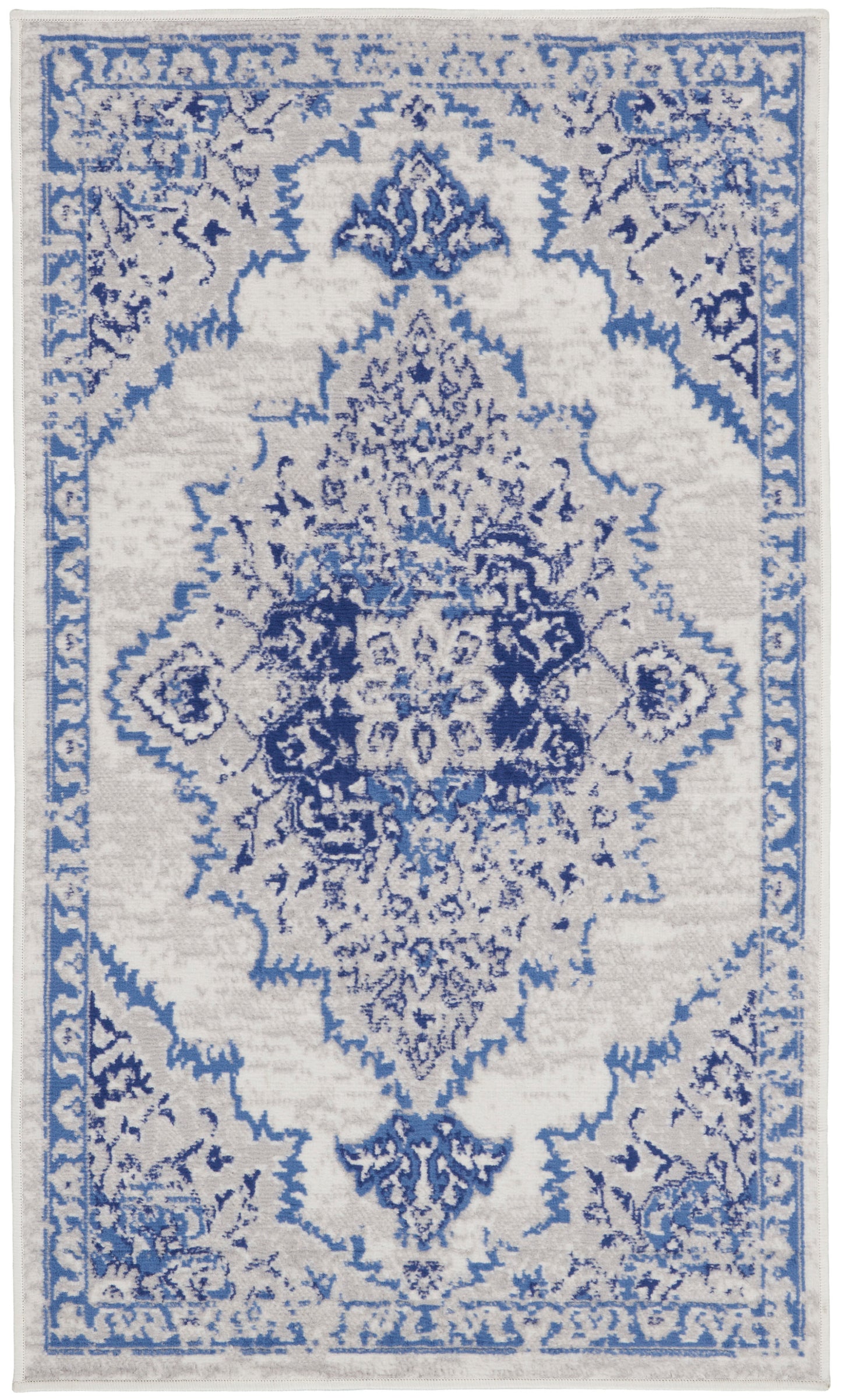 Blue and ivory oriental rug with ornate central medallion and floral border; Persian-inspired vintage style.