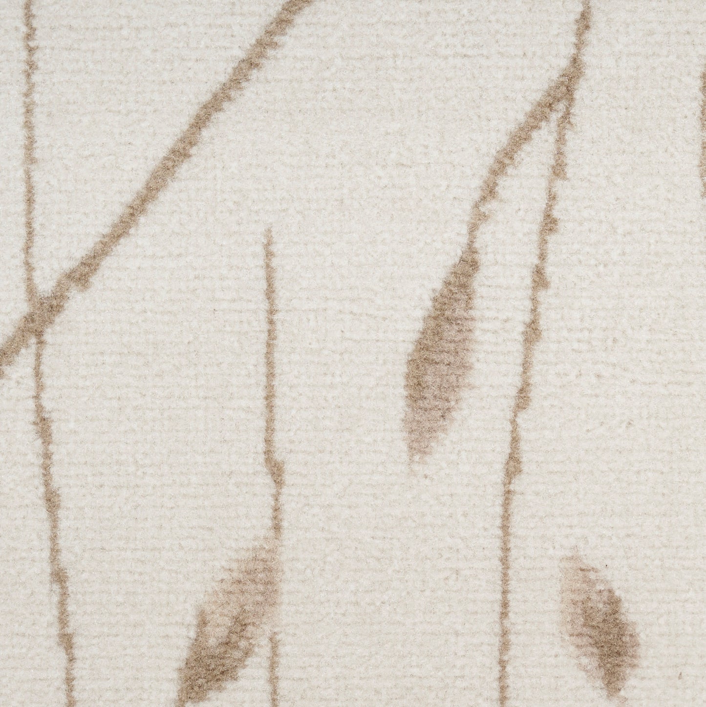 Beige woven textile with brown abstract leaf-like lines; soft, textured fabric.