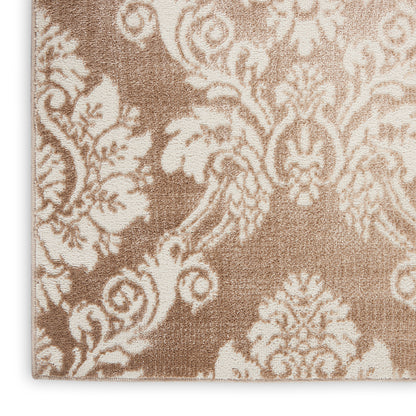 Beige damask patterned rug close-up, ornate floral motif on a soft brown background.