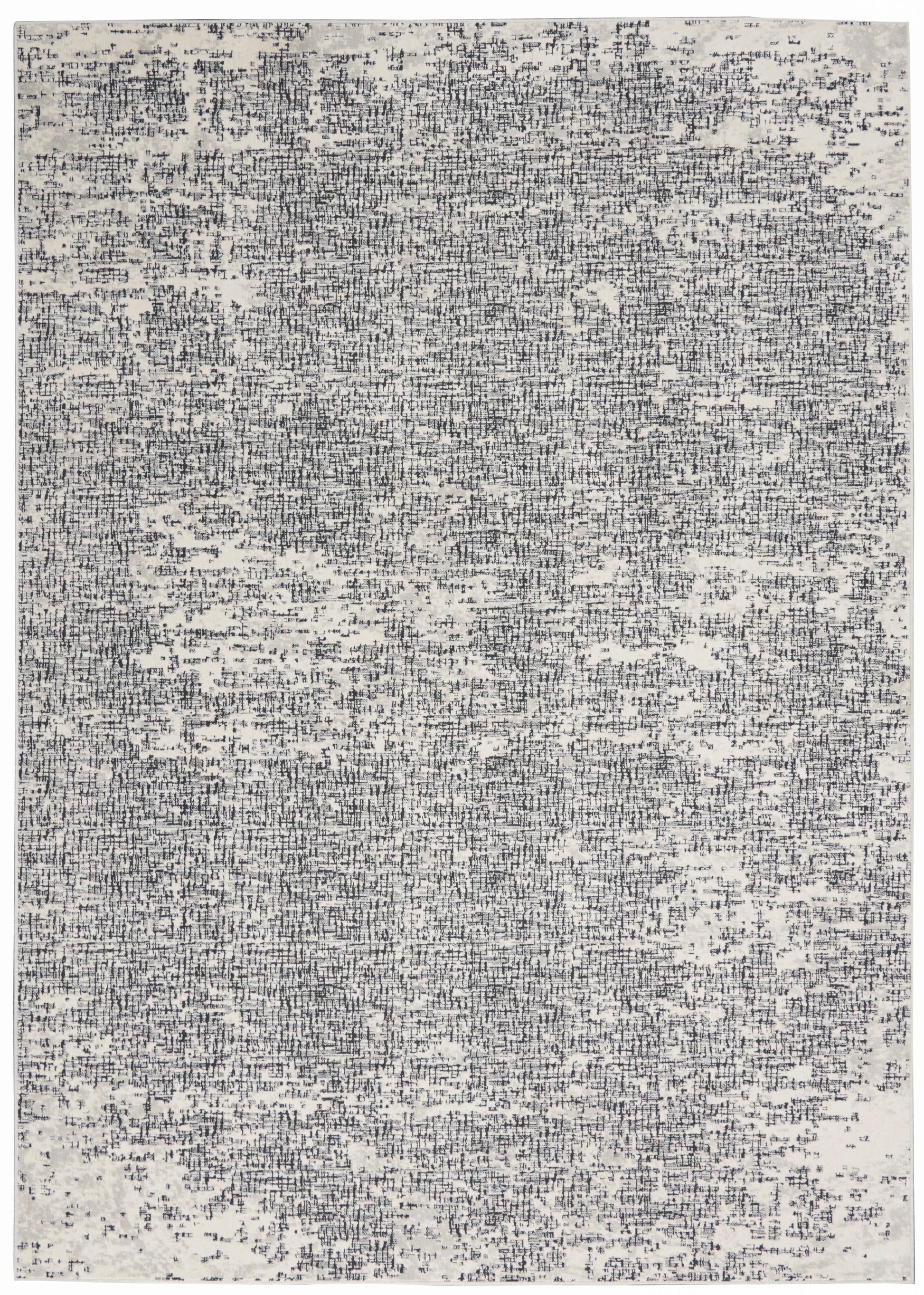 Rectangular rug with a distressed gray and charcoal speckle pattern.