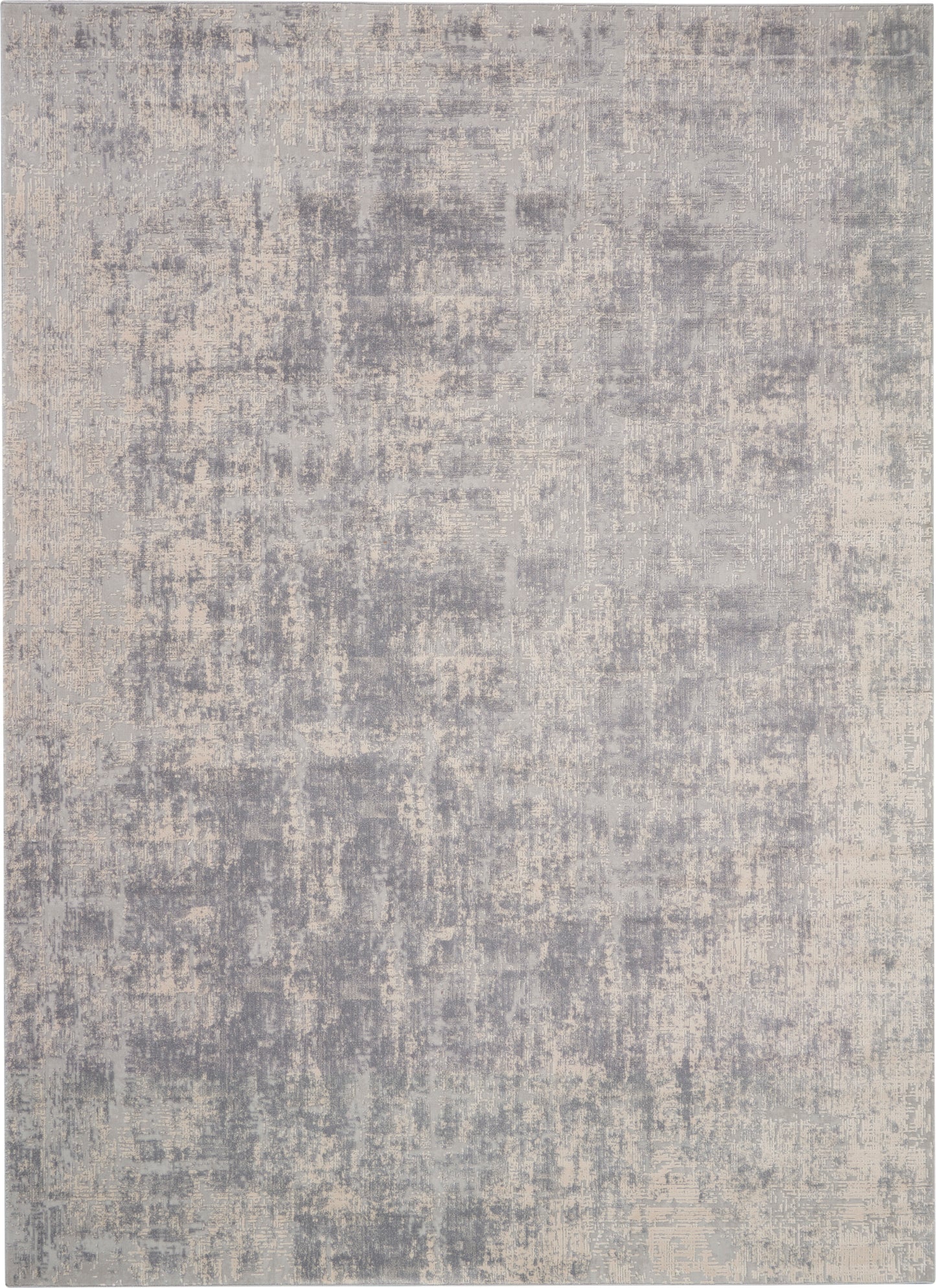 Rectangular area rug in cool gray and beige with an abstract distressed pattern for modern decor.