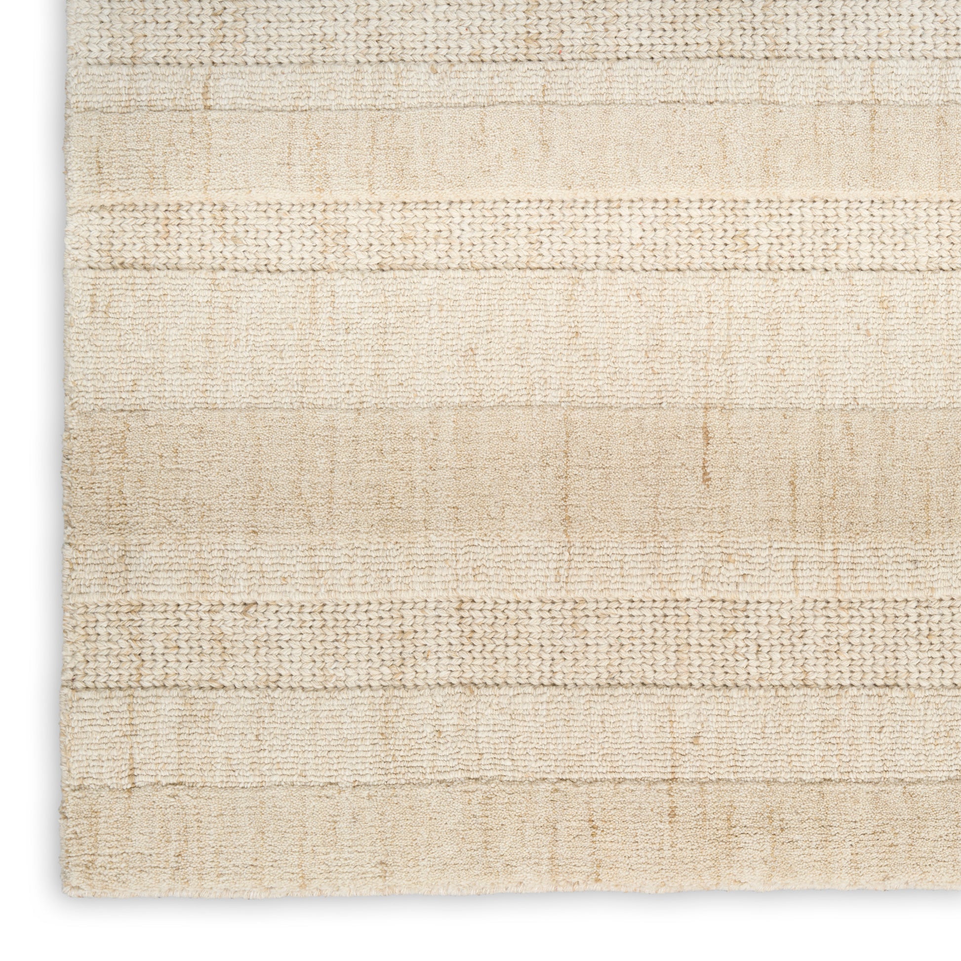 Cream-beige woven rug with subtle horizontal stripes and textured weave; rectangular, soft home decor rug.