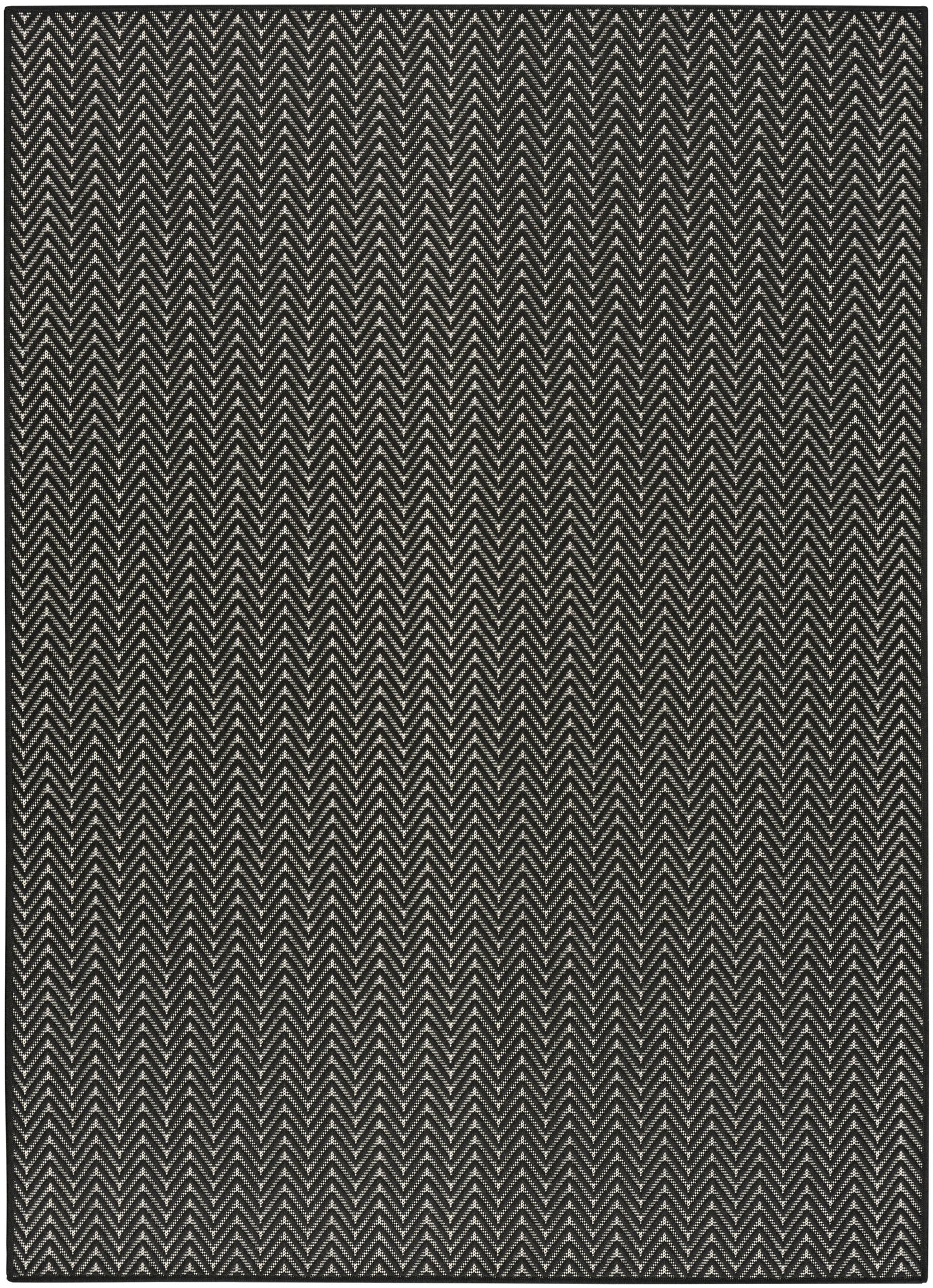Charcoal rug with cream chevron zigzag pattern and woven texture.