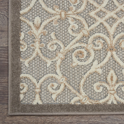 Gray field area rug with cream-beige scrolling arabesque pattern and taupe border; traditional style.