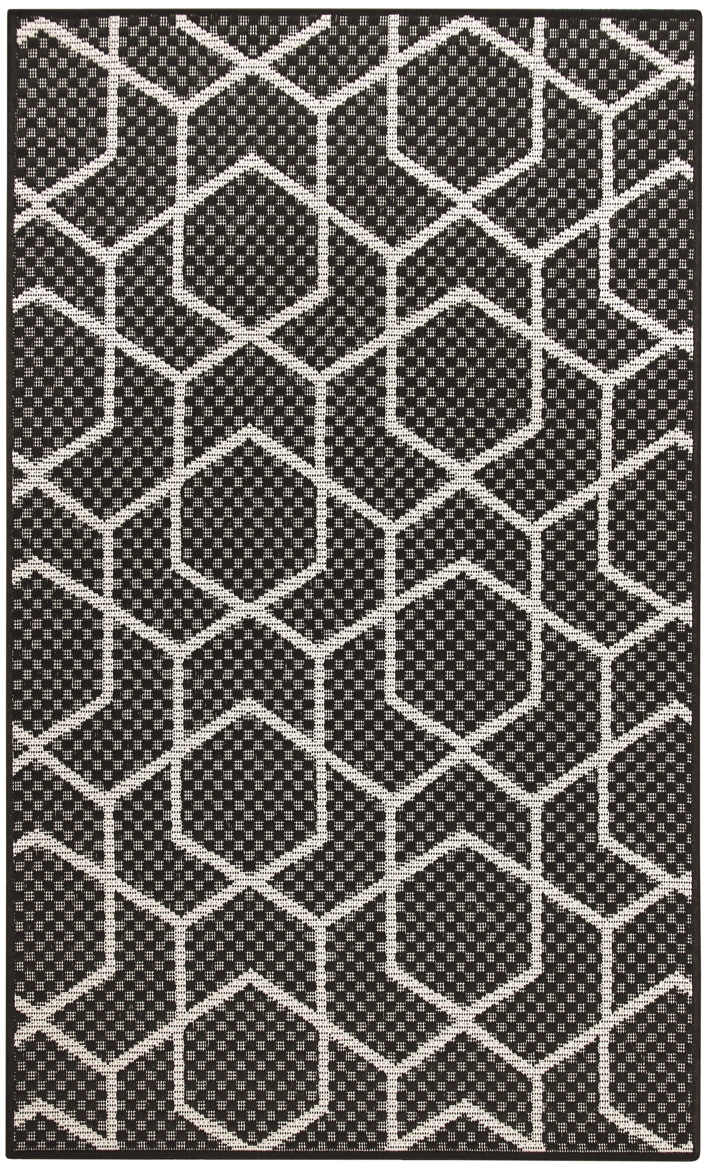 Black and white geometric rug with interconnected hexagons and dotted interiors; modern flat-weave style.