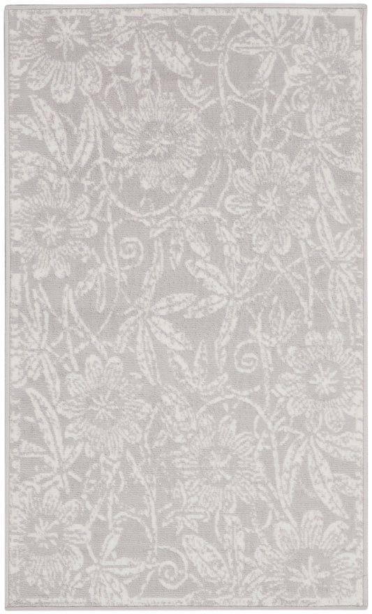 Rectangular gray area rug with white floral damask pattern for classic living room decor