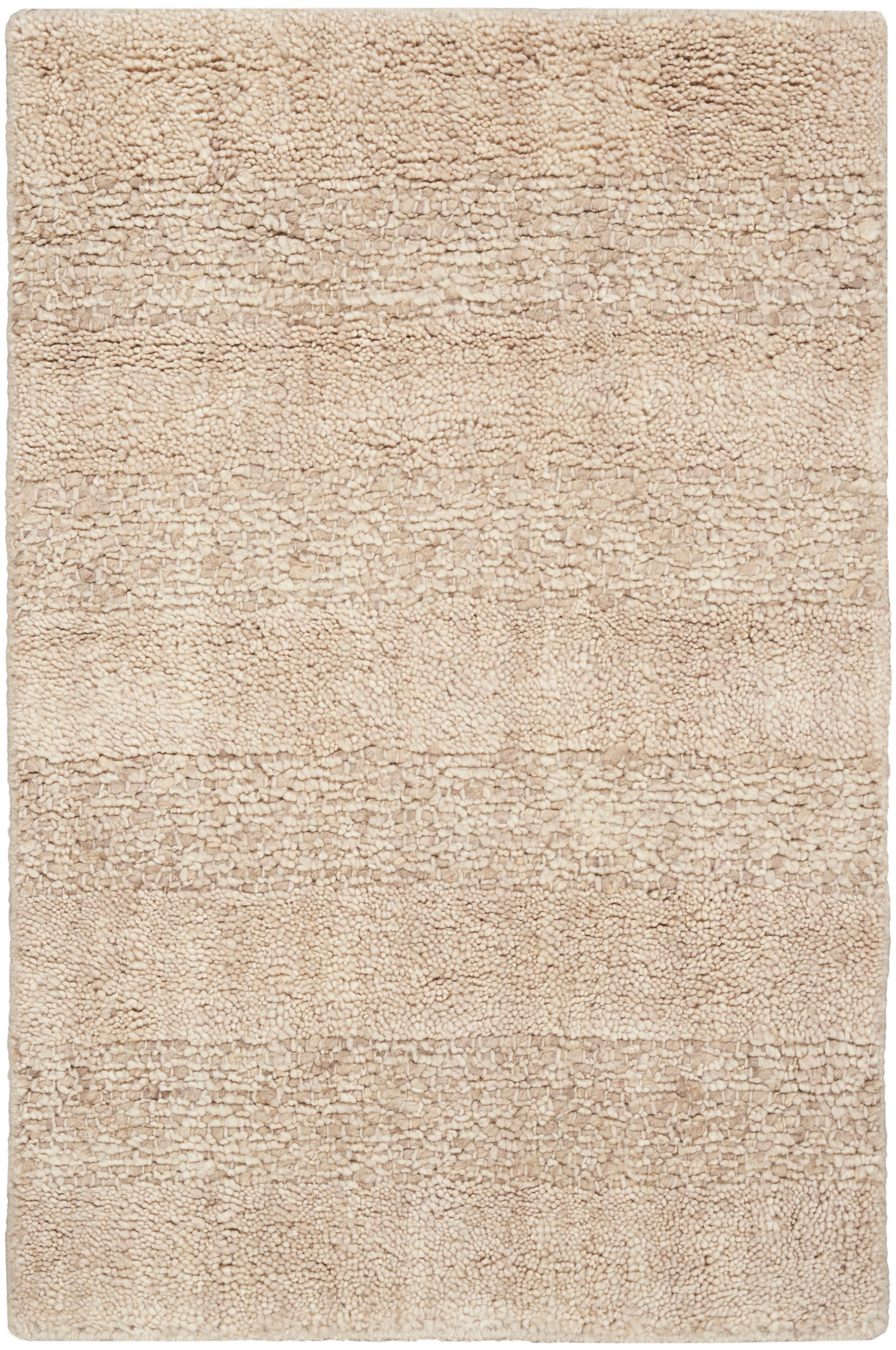 Beige plush shag rug with textured pile and subtle horizontal stripes.