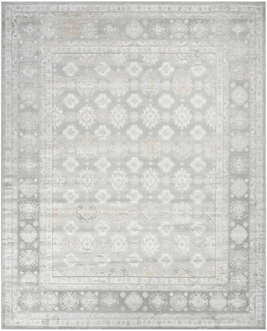 Light gray distressed area rug with ivory floral damask pattern and decorative border; rectangular oriental style.