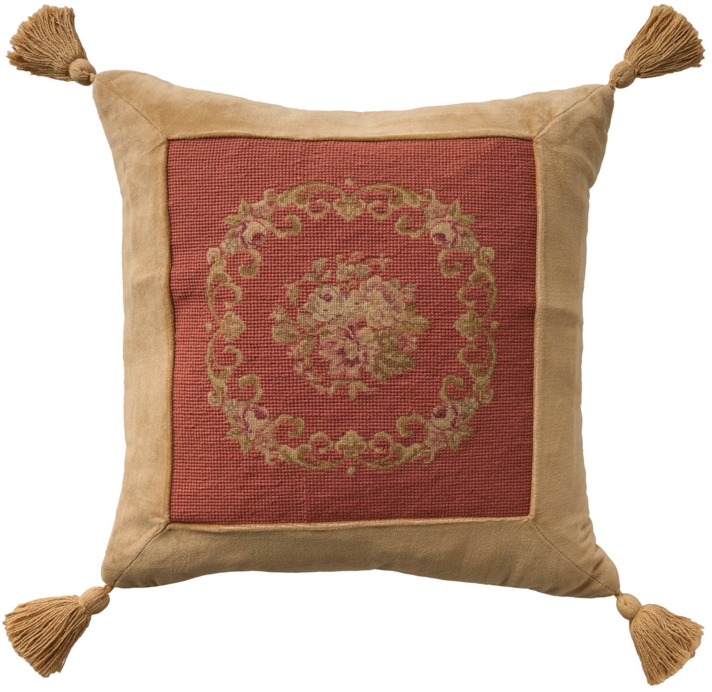 Beige square pillow with red jacquard center featuring gold ornate medallion and tassels at each corner.