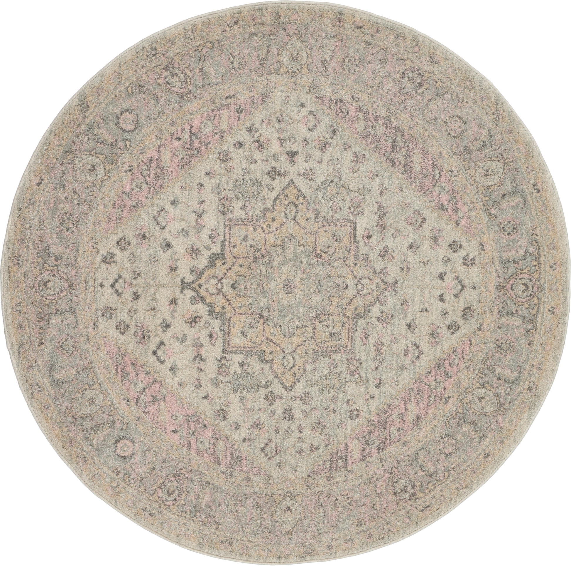 Round vintage-inspired Persian rug in beige-gray with pale pink accents and a delicate central medallion.