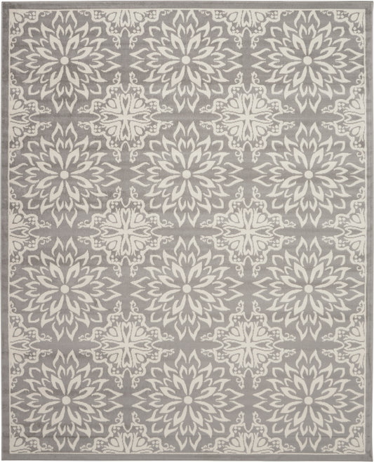 Gray area rug featuring repeating ivory mandala floral medallions and a bordered edge.