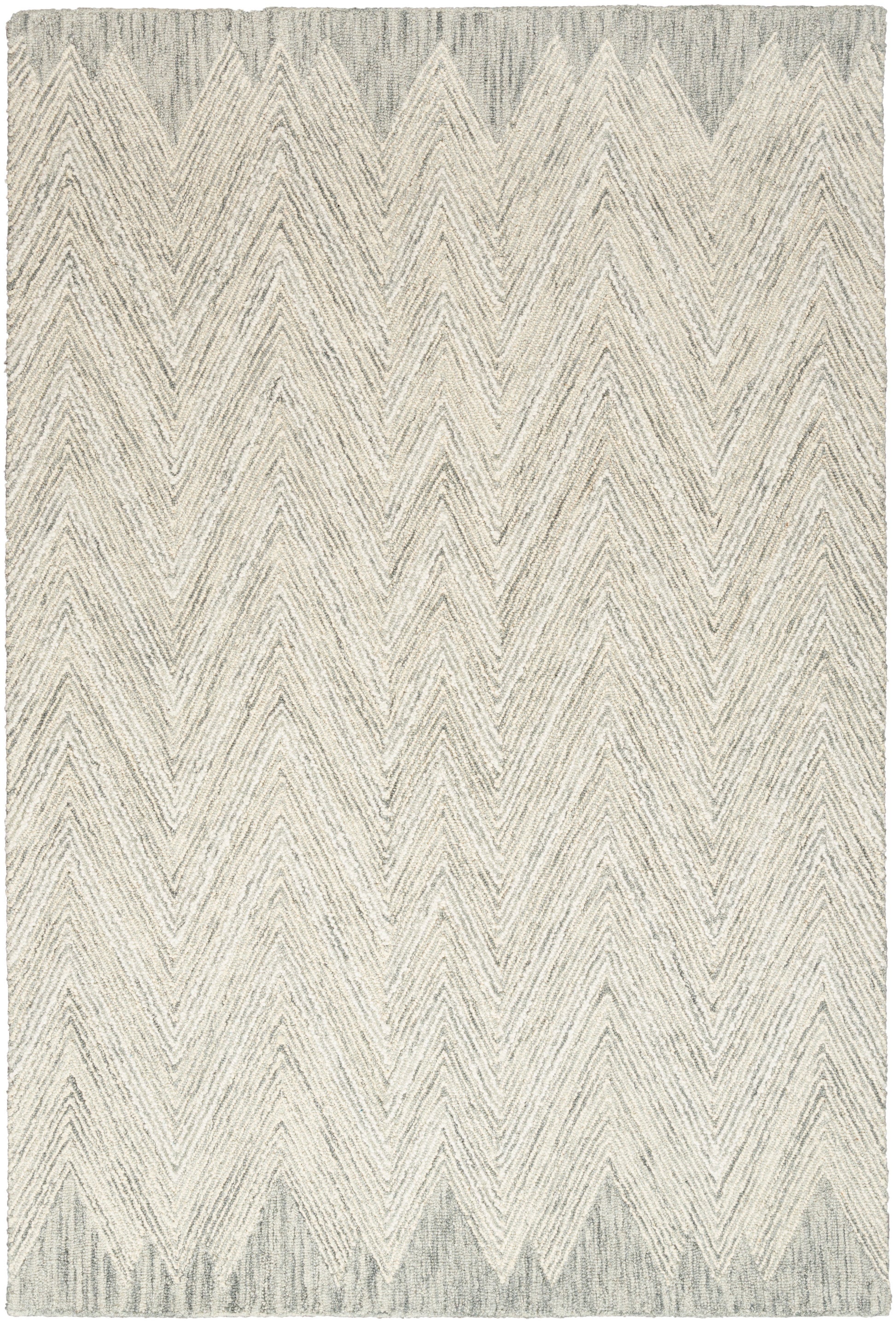 Ivory and gray chevron rug with textured woven pile and subtle zigzag pattern.
