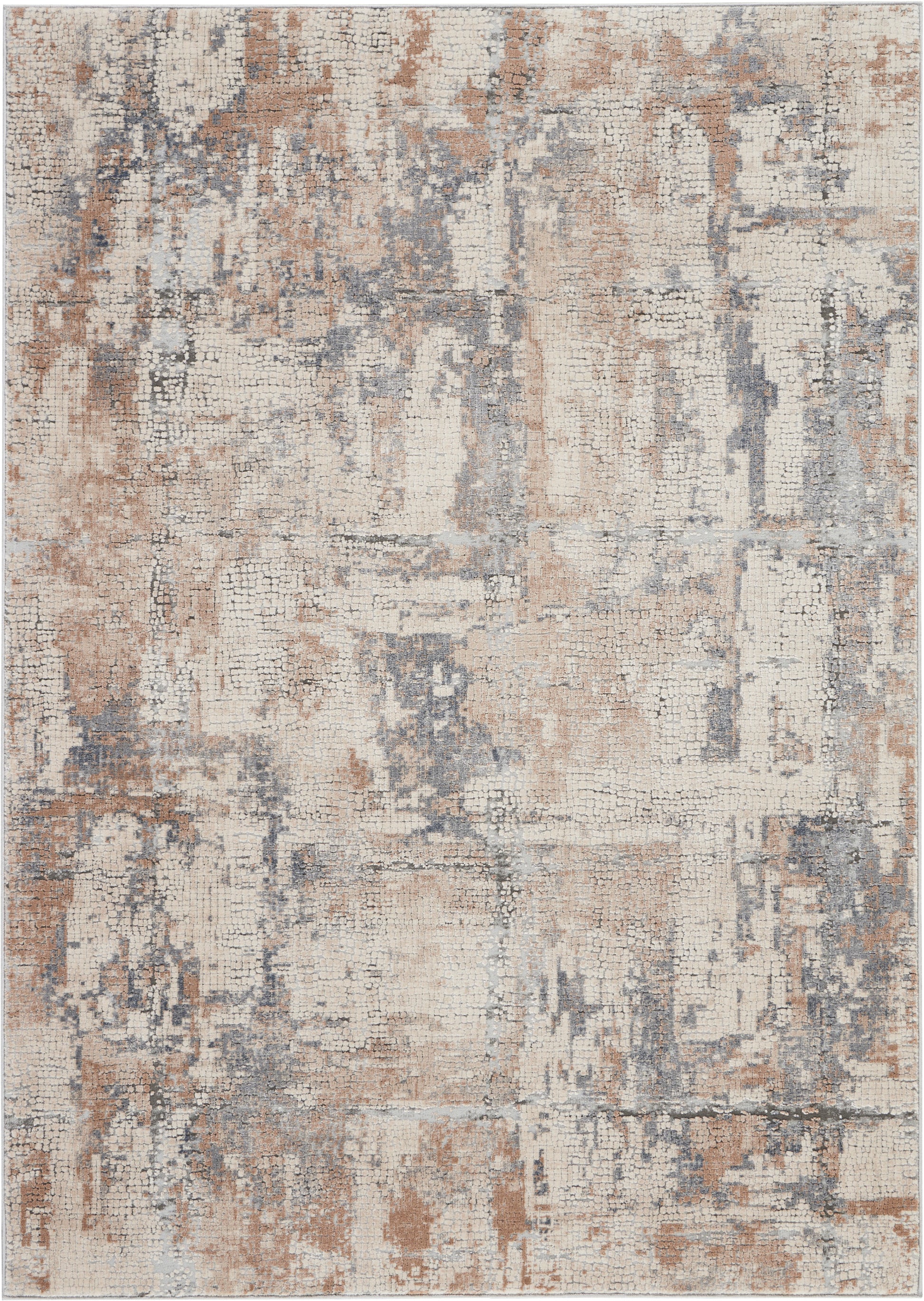 Rectangular distressed abstract rug in beige, tan and muted blue-gray with patchwork pattern and soft woven texture.