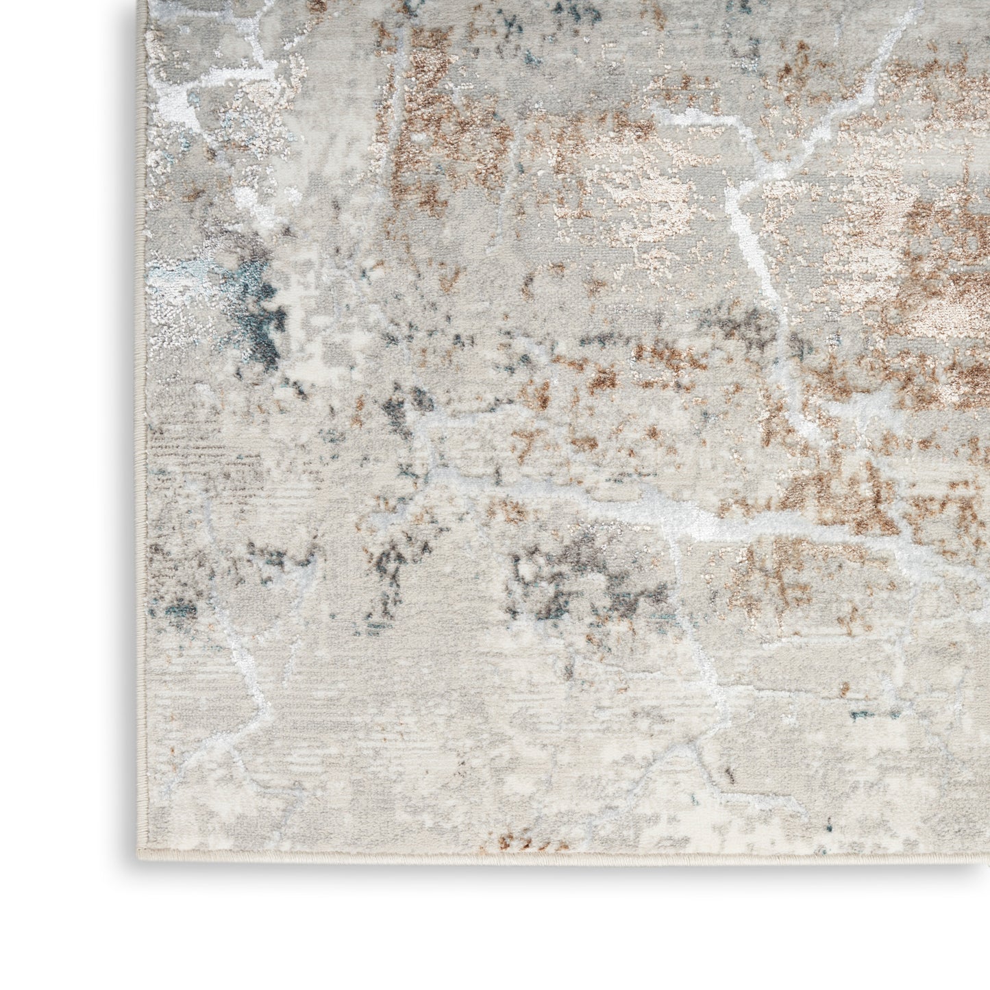 Rectangular abstract area rug in cream and beige with gray, blue and copper-brown marbling.