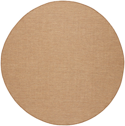 Round natural beige jute placemat with tight woven texture for rustic table setting.