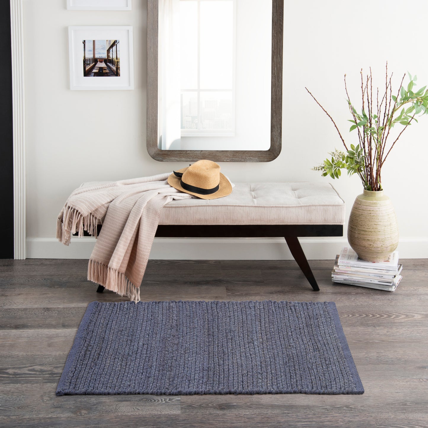 Blue woven farmhouse-style 3' x 5' rug.