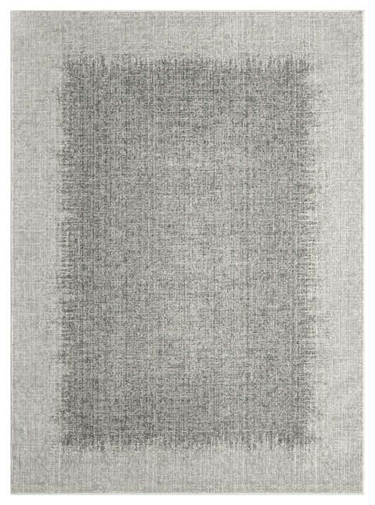 Neutral gray rug with a darker rectangular center wash and a textured, linen-like weave.