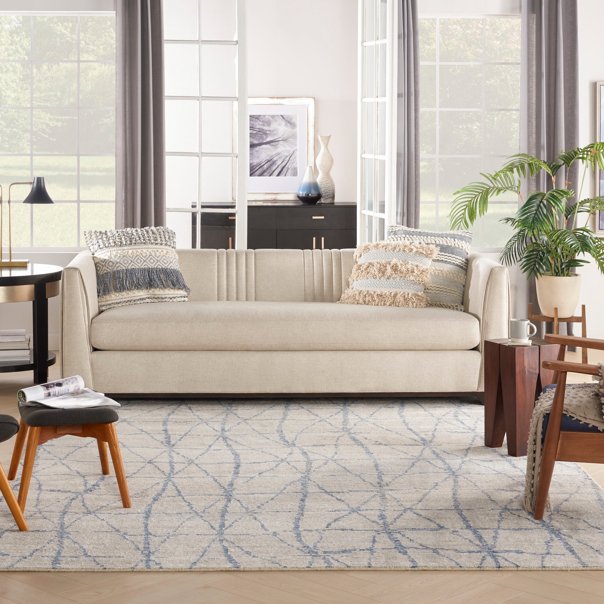 Nourison Ellora 8' x 10' hand-knotted area rug from Primoends with neutral abstract design, wool and rayon blend, modern indoor rug for living room, bedroom, or dining room décor.