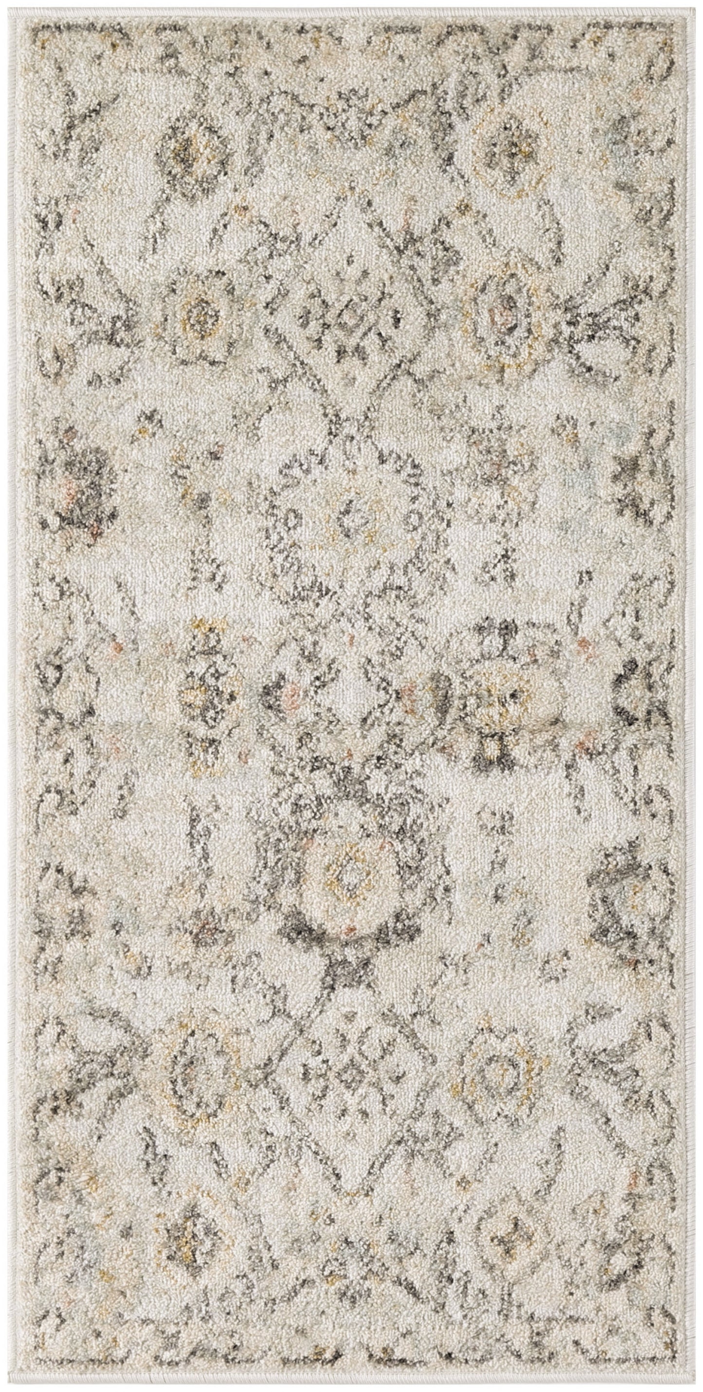 Ivory distressed Persian-style rug with muted gray & beige & gold floral medallions; rectangular, high-pile.