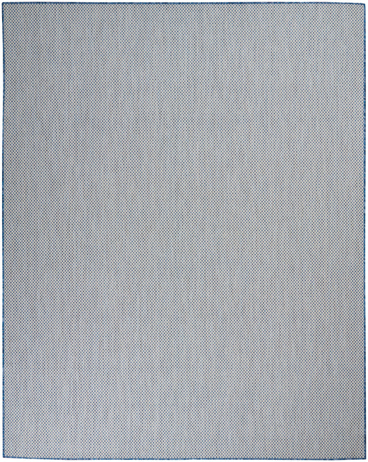 Rectangular light gray textured rug with a fine blue dot pattern and blue edge trim (8' x 10').