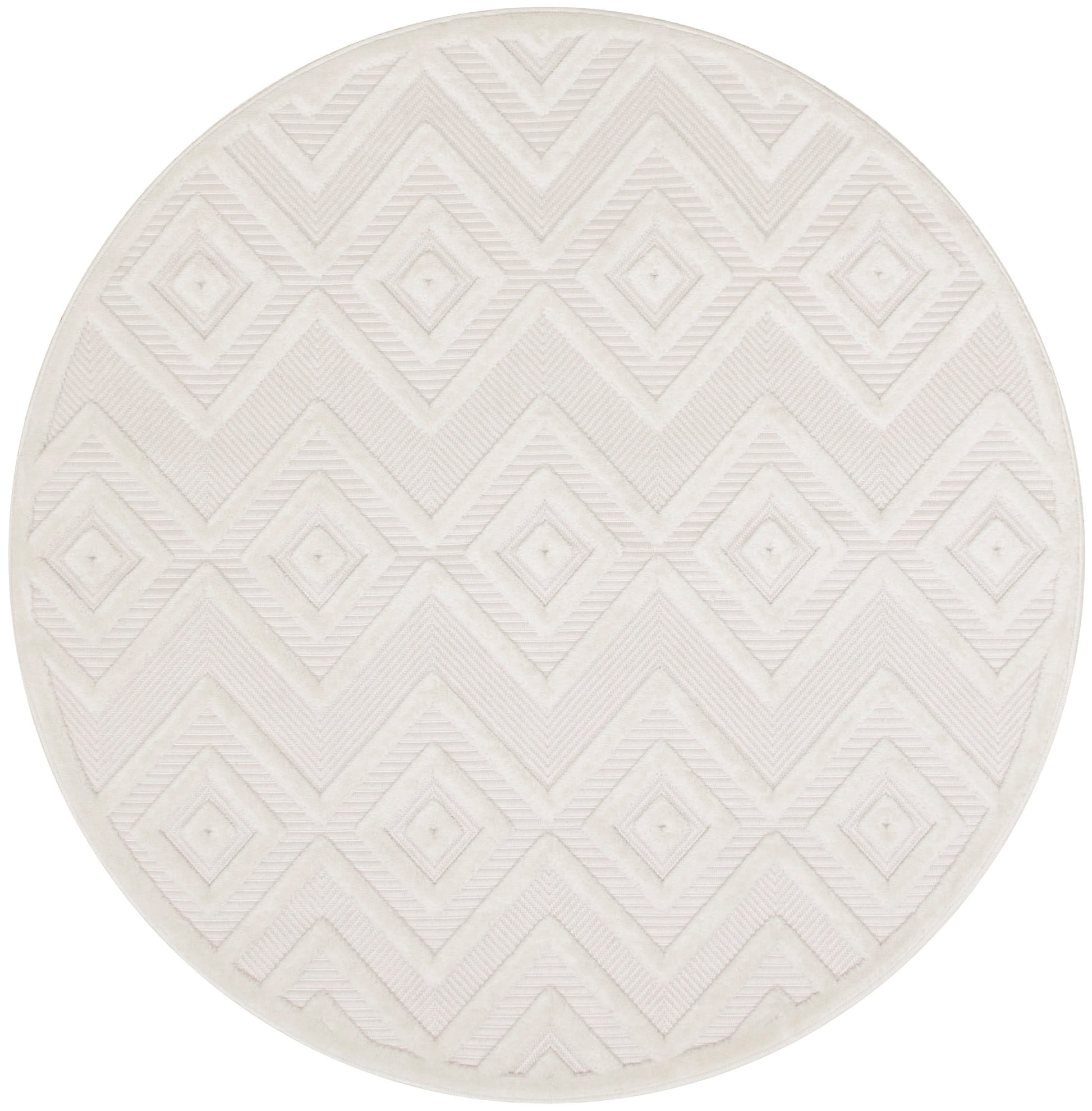 Round off-white rug with raised diamond and chevron geometric pattern; textured, soft fabric for modern living spaces.