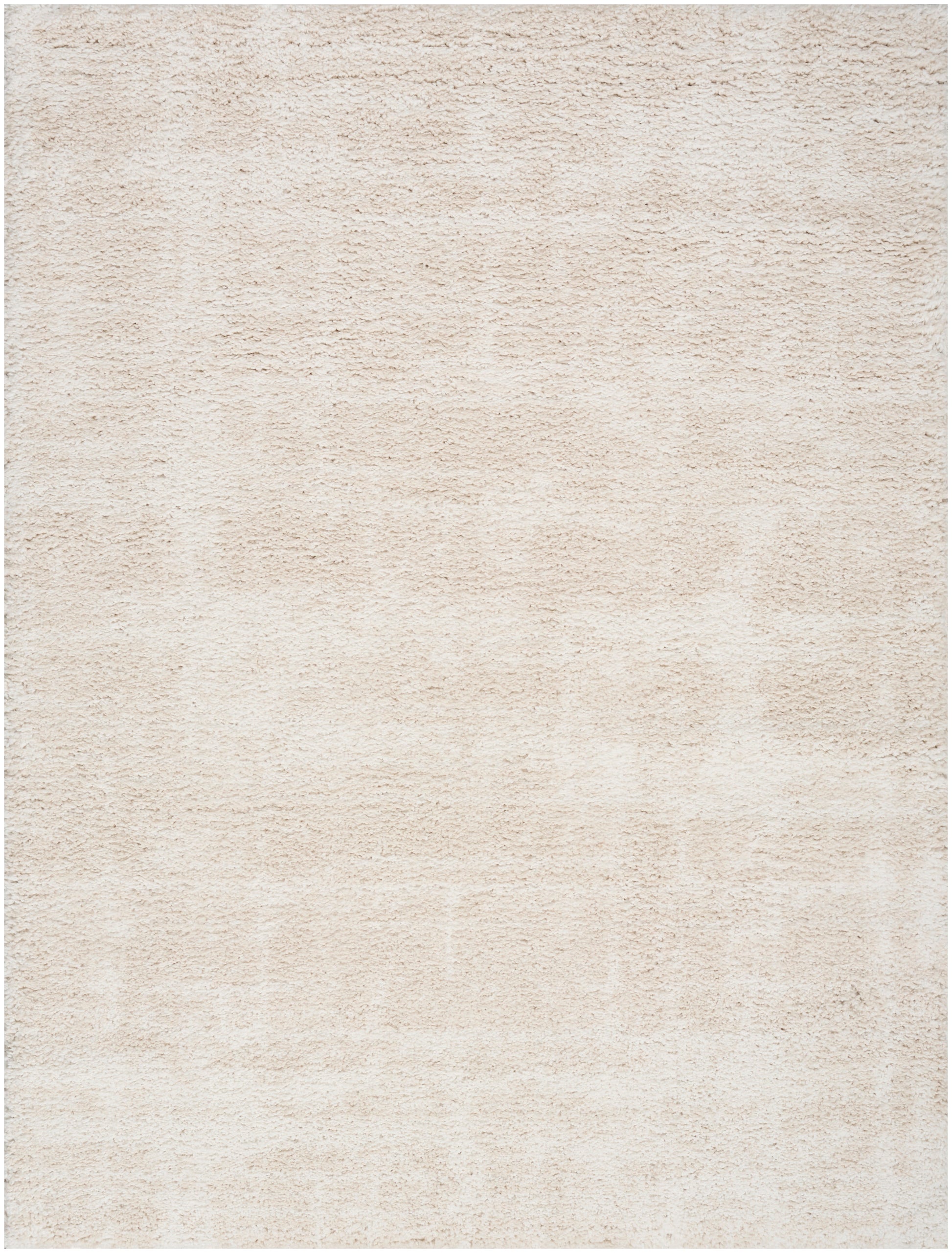Cream beige textured rug with a soft, plush pile.
