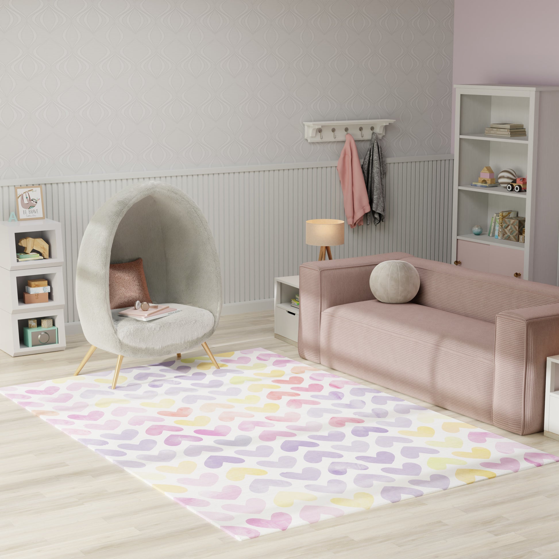 Pastel kids' room with bubble-gray shag pod chair, pink sofa, pastel heart rug, white shelves, coat rack and lamp.