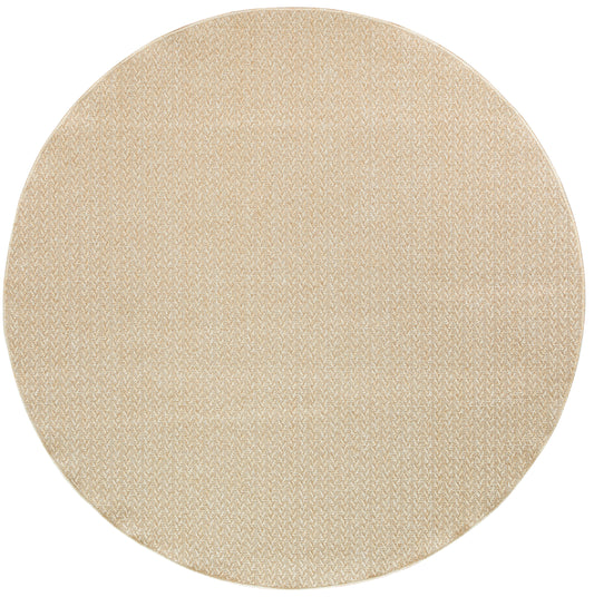 Round beige woven rug with subtle chevron texture, natural fiber style.