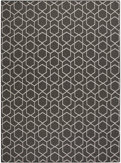 Dark gray area rug with an off-white hexagon lattice pattern and subtle woven texture.