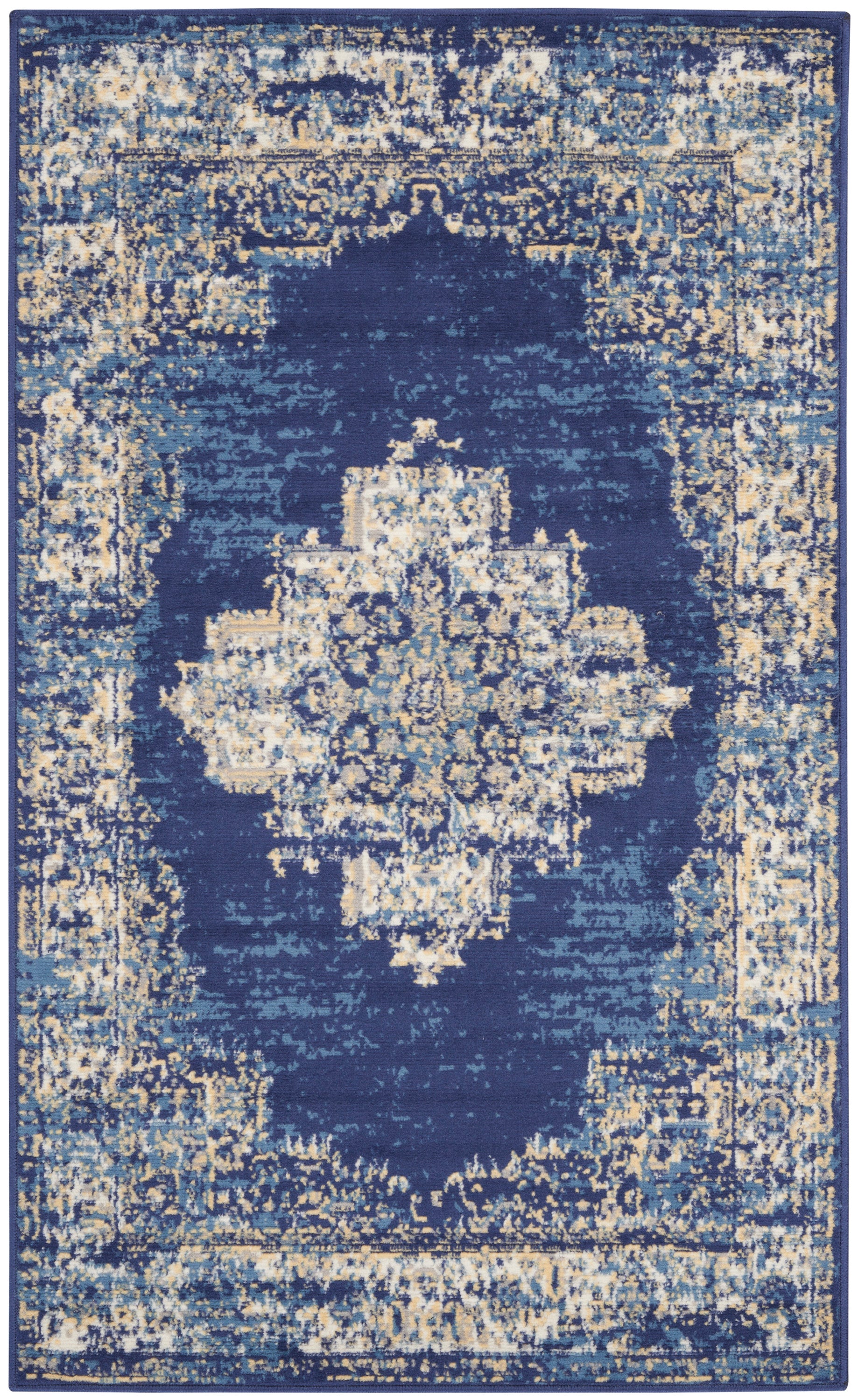 Rectangular blue distressed oriental rug with ivory and gold central medallion and ornate border.