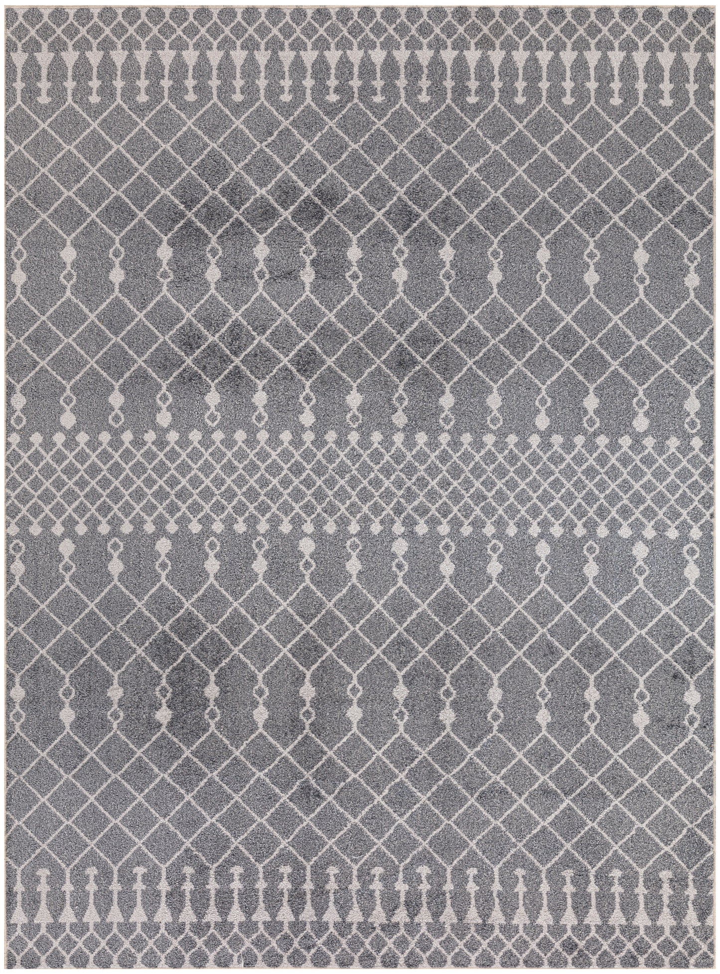 Grey Bohemian area rug featuring a white diamond lattice pattern and decorative border bands.