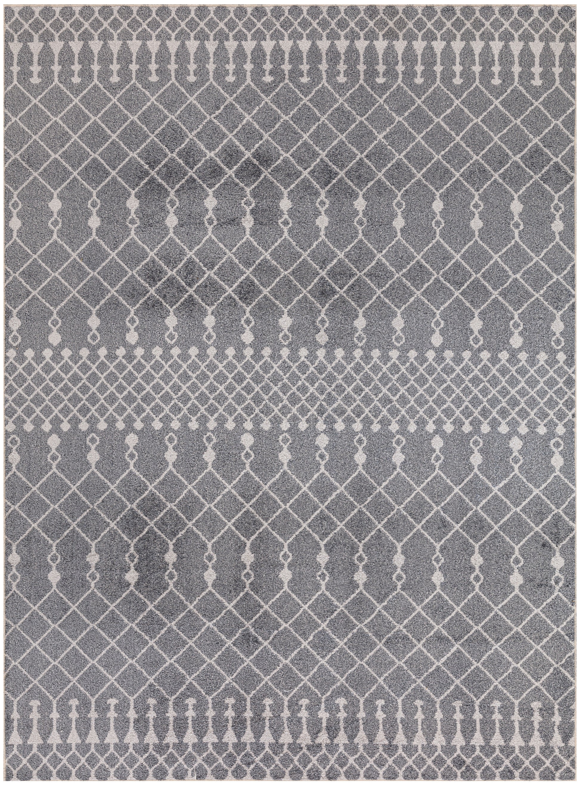 Grey Bohemian area rug featuring a white diamond lattice pattern and decorative border bands.