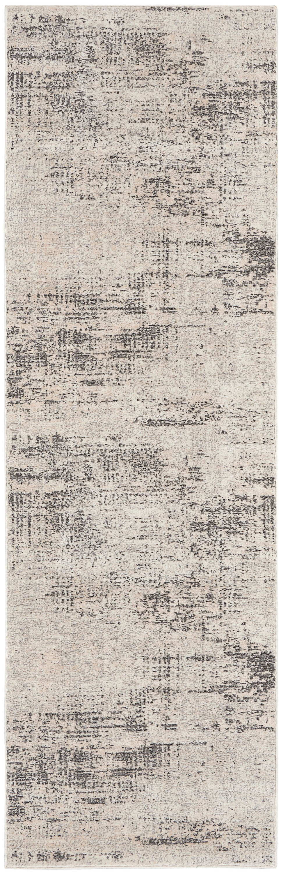 Beige distressed abstract runner rug with gray charcoal patches; modern, low-pile hallway decor.