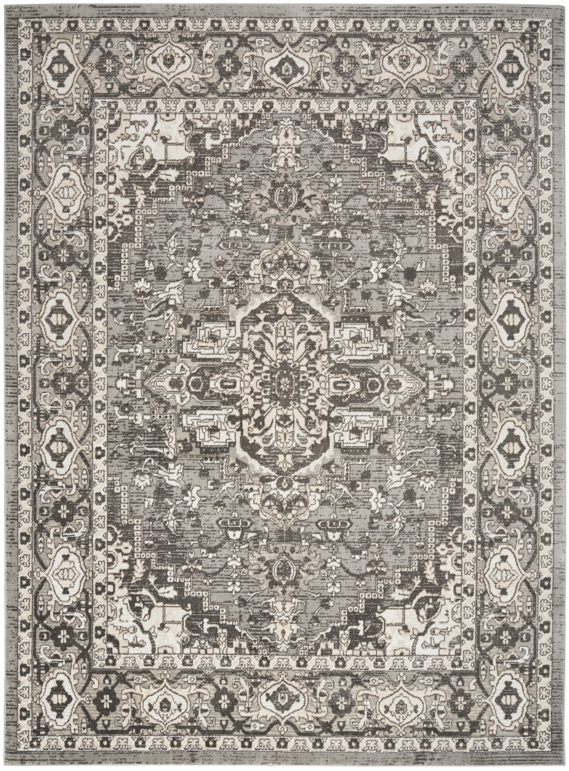 Distressed grayscale Persian-style rug with central medallion and ornate floral border in ivory, taupe & charcoal.