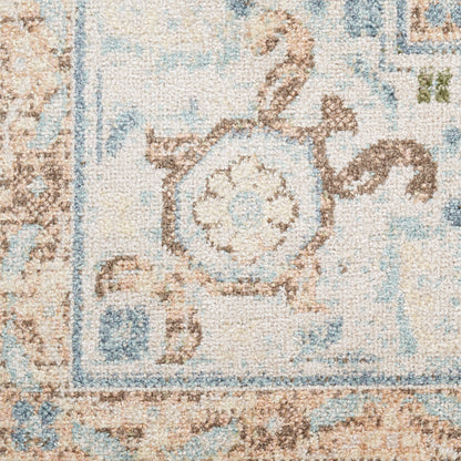 Close-up of a beige, blue and brown oriental runner rug with an ornate floral medallion and soft border.